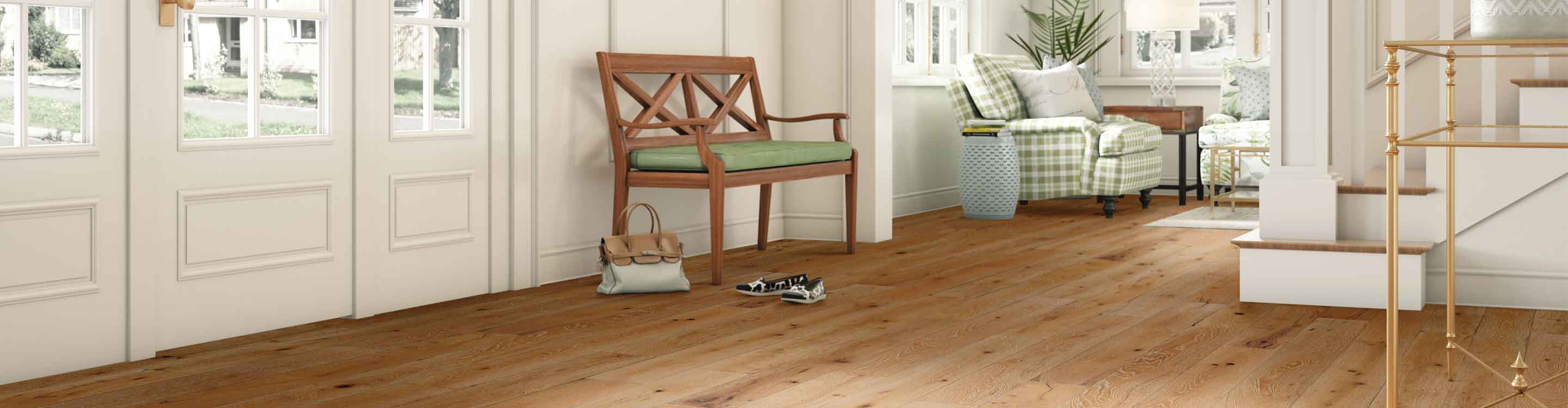 entryway with light knotted hardwood flooring , wood entryway bench and green accents